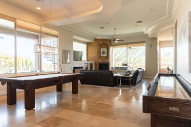 Luxe Lookout: Desert Retreat with Pool, Rooftop & Games image 14
