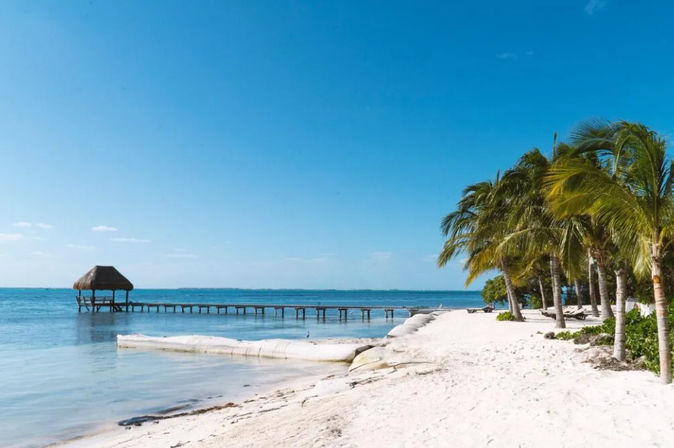 Pearls of the Caribbean: Guided Day Trip to Isla Mujeres and Isla Contoy image 1