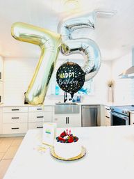 Birthday Setup with Vibrant Balloons, Cake & Personalized Card image