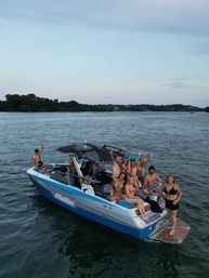 Big Tex Boat Rentals & ATX WakeSurf: Wakesurfing and Wakeboarding Boat Charters on Lake Austin image 4