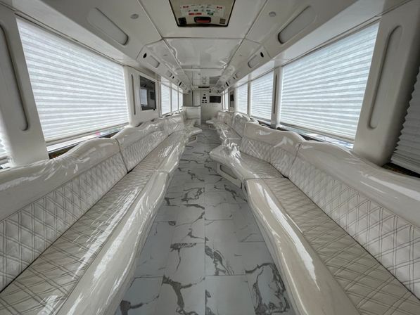 VIP Luxury Party Bus with Built-in Bar/DJ Booth, Restroom & More (50-Passenger Capacity) image 9