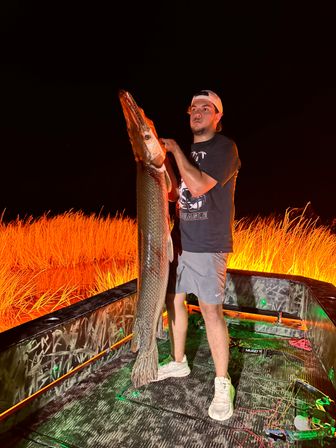 Nighttime Bowfishing: Fishing Meets Archery for the Ultimate Bachelor Experience image 6