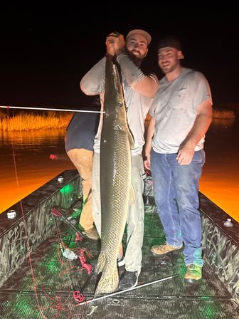 Nighttime Bowfishing: Fishing Meets Archery for the Ultimate Bachelor Experience image 2