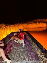 Nighttime Bowfishing: Fishing Meets Archery for the Ultimate Bachelor Experience image 10