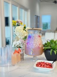 Complete Mocktail Bar Setup with Stylish Bar, Delicious Ingredients & Fresh Garnishes image