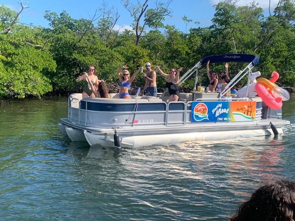 BYOB 12-Person Party Boat, Sandbar Swim with Floaties, and Yachts + Mansions Tour image 9