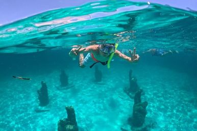 Private Catamaran Tour to Isla Mujeres: Captain, Crew, Snorkeling, Beach Club + Open Bar image 6