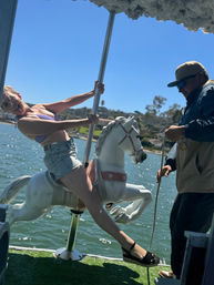 Iconic Pink BYOB Carousel Boat Experience with Upper Terrace, Carousel Horse Prop, and more image 26