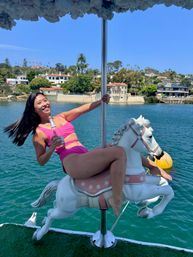 Iconic Pink BYOB Carousel Boat Experience with Upper Terrace, Carousel Horse Prop, and more image 13