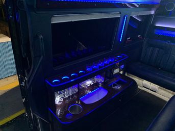 Luxury Party Bus, Limo Services, and Other Transportation with Complimentary Champagne image 10