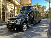 Thumbnail image for 25-Passenger Party Bus Rental with Dance Poles, Bluetooth Audio & Driver as Directed (BYOB)