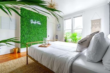 Jungle Fever: Designer Jungle-Inspired 3BR + Walk to Nightlife image 5