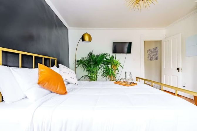 Jungle Fever: Designer Jungle-Inspired 3BR + Walk to Nightlife image 26