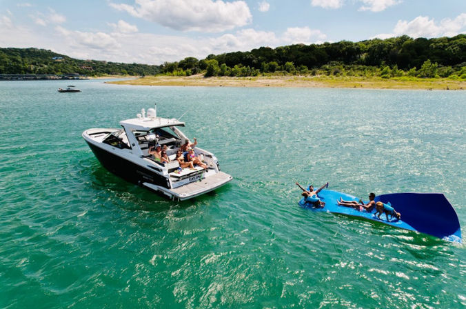 Luxury Yacht Party Rental on Lake Travis: 38' Monterey 378 with Captain, Aqua Lily Pad & More image 1