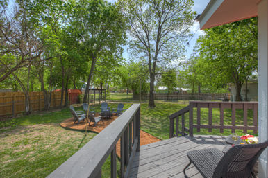 The Pink Haus: Luxe 3BR Retreat 1 Mile from Main Street with Firepit & Cozy Design image 63