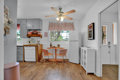 The Pink Haus: Luxe 3BR Retreat 1 Mile from Main Street with Firepit & Cozy Design image 4