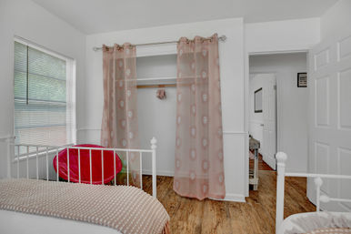 The Pink Haus: Luxe 3BR Retreat 1 Mile from Main Street with Firepit & Cozy Design image 34