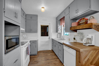 The Pink Haus: Luxe 3BR Retreat 1 Mile from Main Street with Firepit & Cozy Design image 7