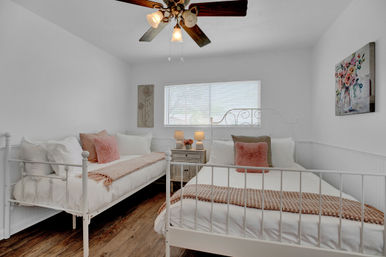 The Pink Haus: Luxe 3BR Retreat 1 Mile from Main Street with Firepit & Cozy Design image 33