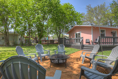 The Pink Haus: Luxe 3BR Retreat 1 Mile from Main Street with Firepit & Cozy Design image 47