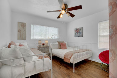 The Pink Haus: Luxe 3BR Retreat 1 Mile from Main Street with Firepit & Cozy Design image 32