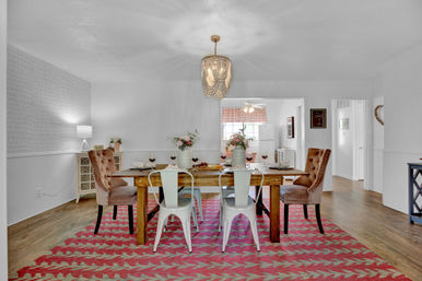 The Pink Haus: Luxe 3BR Retreat 1 Mile from Main Street with Firepit & Cozy Design image 12