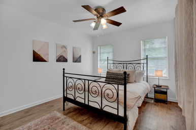 The Pink Haus: Luxe 3BR Retreat 1 Mile from Main Street with Firepit & Cozy Design image 30
