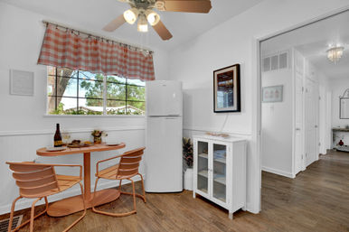 The Pink Haus: Luxe 3BR Retreat 1 Mile from Main Street with Firepit & Cozy Design image 5