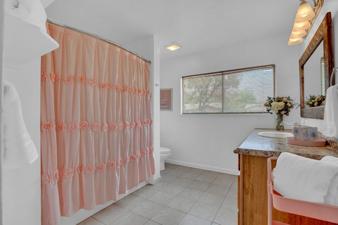 The Pink Haus: Luxe 3BR Retreat 1 Mile from Main Street with Firepit & Cozy Design image 38