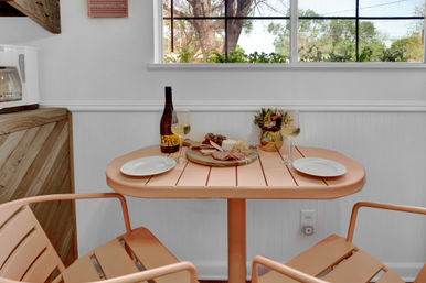 The Pink Haus: Luxe 3BR Retreat 1 Mile from Main Street with Firepit & Cozy Design image 6