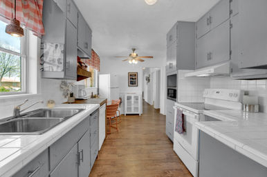 The Pink Haus: Luxe 3BR Retreat 1 Mile from Main Street with Firepit & Cozy Design image 11