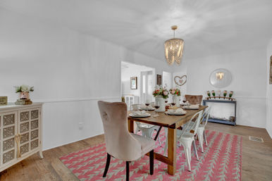 The Pink Haus: Luxe 3BR Retreat 1 Mile from Main Street with Firepit & Cozy Design image 13