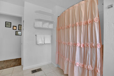 The Pink Haus: Luxe 3BR Retreat 1 Mile from Main Street with Firepit & Cozy Design image 41