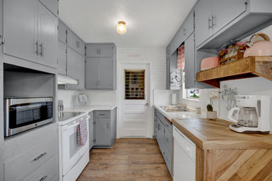 The Pink Haus: Luxe 3BR Retreat 1 Mile from Main Street with Firepit & Cozy Design image 8