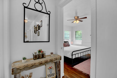 The Pink Haus: Luxe 3BR Retreat 1 Mile from Main Street with Firepit & Cozy Design image 35