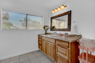 The Pink Haus: Luxe 3BR Retreat 1 Mile from Main Street with Firepit & Cozy Design image 40