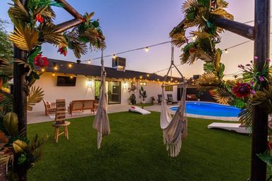 Tropic Oasis: Stylish Rental with Heated Pool, Mural Wall & Views of Camelback Mountain image 23