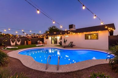 Tropic Oasis: Stylish Rental with Heated Pool, Mural Wall & Views of Camelback Mountain image 10