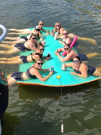Party on the Lake: Private Bentley Tritoon Charter for Up to 12 Passengers image 9