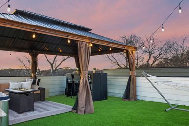 The Lyric: Modern 4-Bedroom Retreat with Rooftop Access and Fire Pit image 40