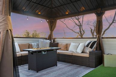 The Lyric: Modern 4-Bedroom Retreat with Rooftop Access and Fire Pit image 43