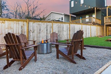 The Lyric: Modern 4-Bedroom Retreat with Rooftop Access and Fire Pit image 39