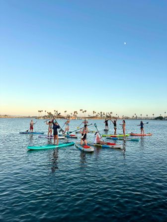 Sunset Paddleboarding & Sauna Experience image 5