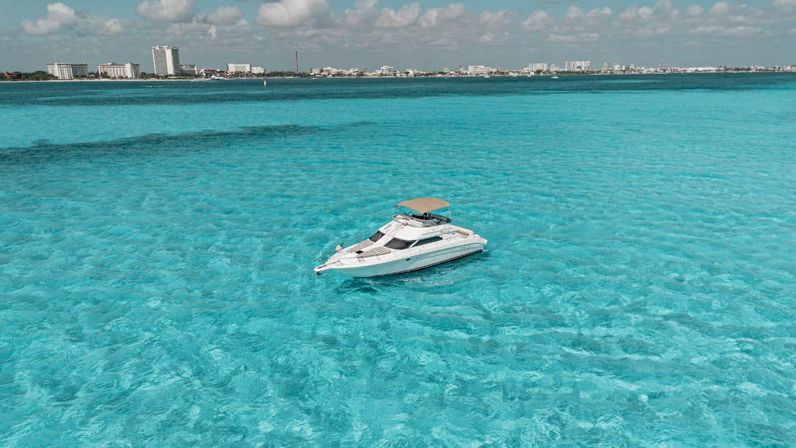 Private 50' Flybridge Luxury Yacht Charter: Cruise & Snorkel around Isla Mujeres & Cancun Lagoon image 4