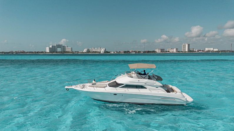 Private 50' Flybridge Luxury Yacht Charter: Cruise & Snorkel around Isla Mujeres & Cancun Lagoon image 7