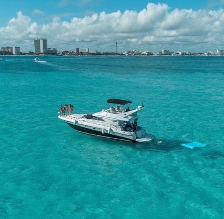 Private 50' Flybridge Luxury Yacht Charter: Cruise & Snorkel around Isla Mujeres & Cancun Lagoon image 1
