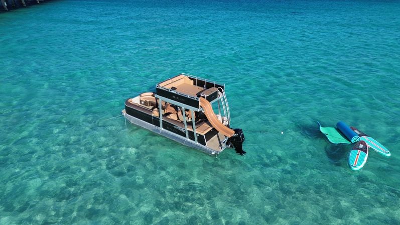 Private Crab Island Luxury Slide Pontoon Charter  image 1
