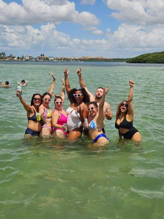 BYOB Floating Tiki Boat Party in St Pete with Expert Crew, Scenic Views, Shot-Ski, and More! image 11
