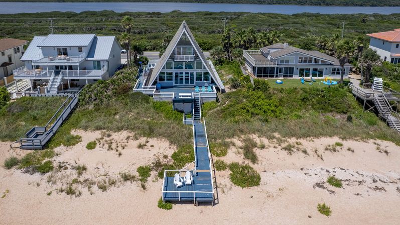 Captains Quarters: 3 BR Beachfront A-Frame with Pool image 1