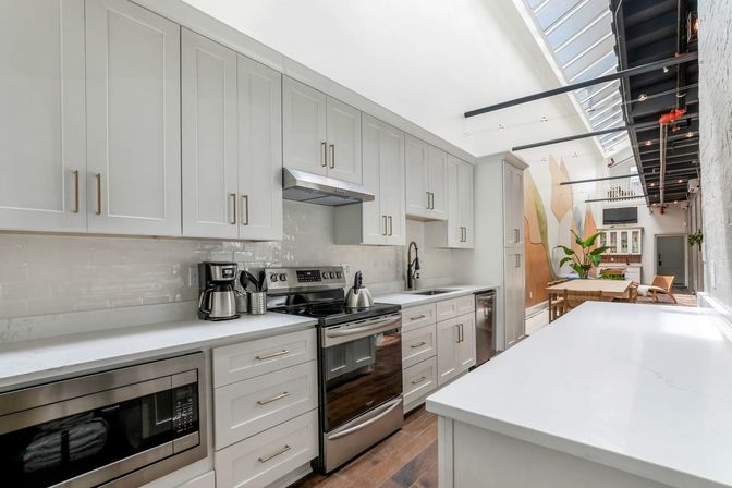 Double Condo Rental with Luxurious Art-Filled Suites & Private Rooftop Terrace Near French Quarter and Superdome image 46